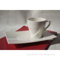 plain white porcelain coffee cup with saucer